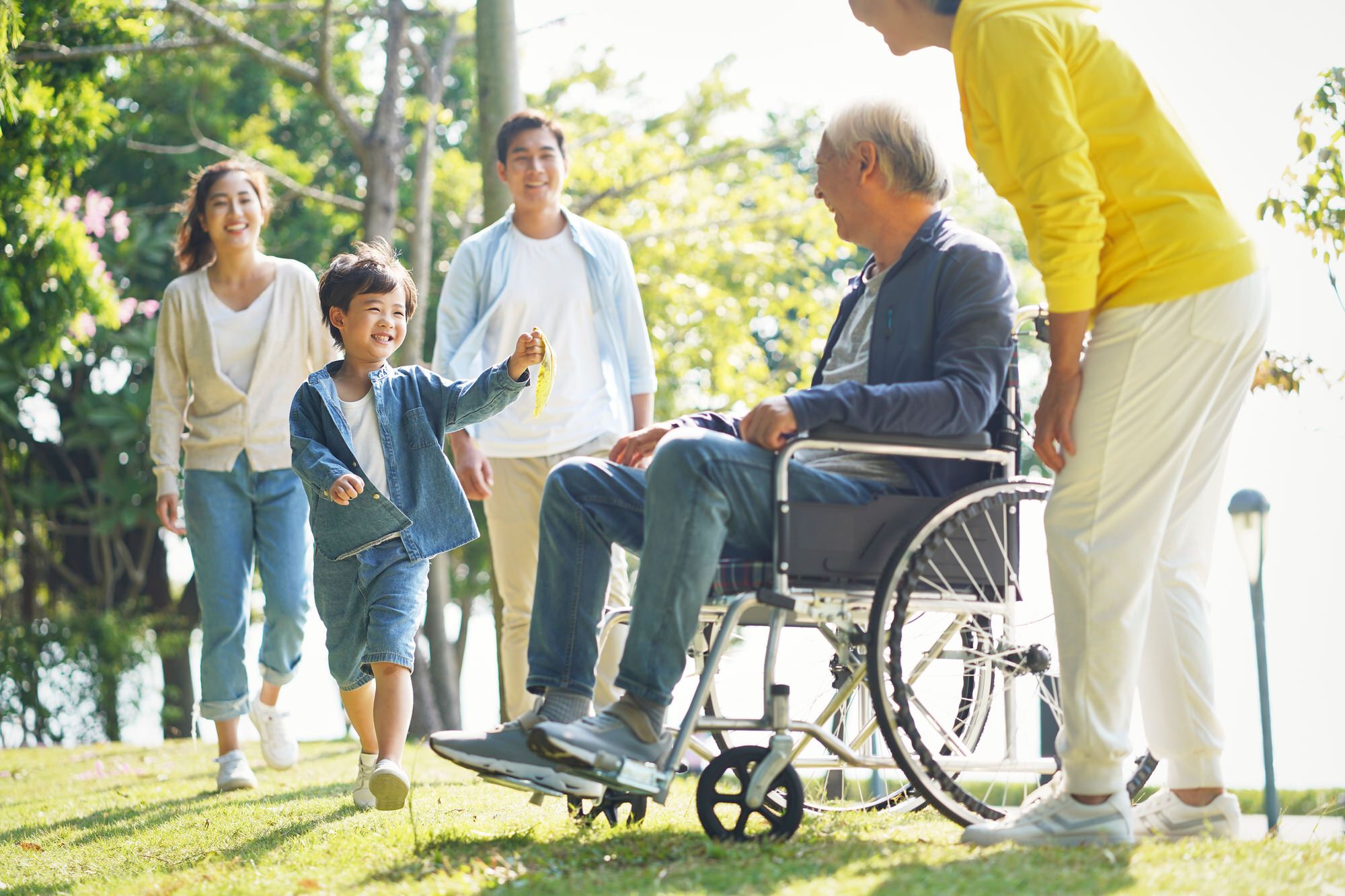 Senior Man meeting family outdoors